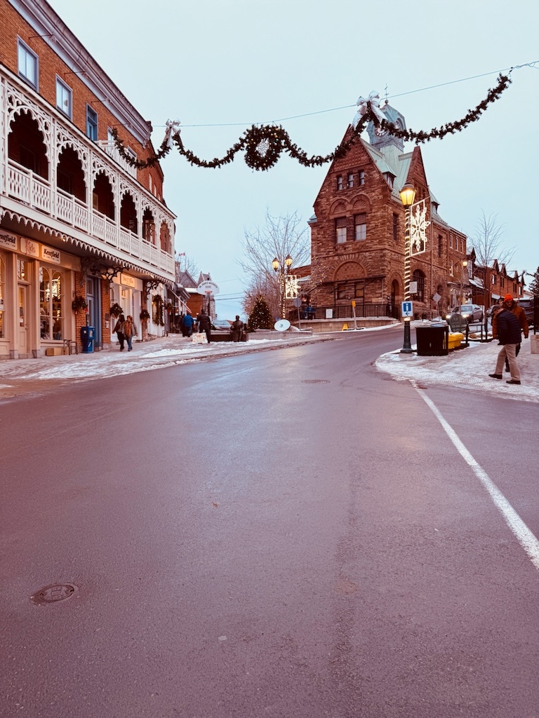 snowy downtown Almonte Ontario decorated for Christmas lights and holiday shopping on a Christmas weekend getaway